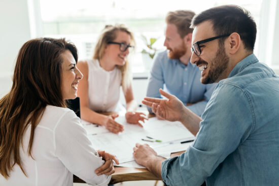 Group of architects and business people working together and brainstorming